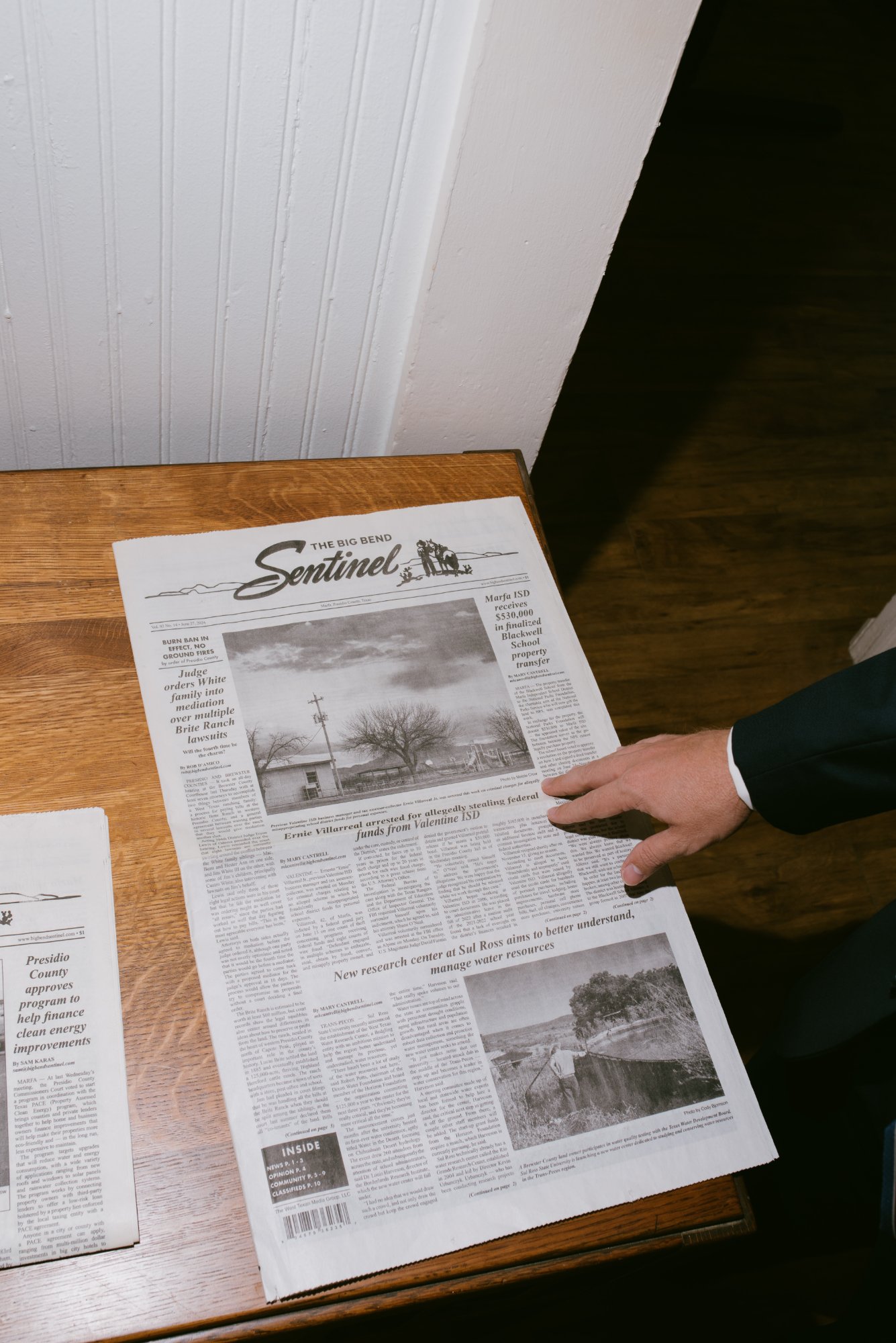 Shane O'Neal with newspaper